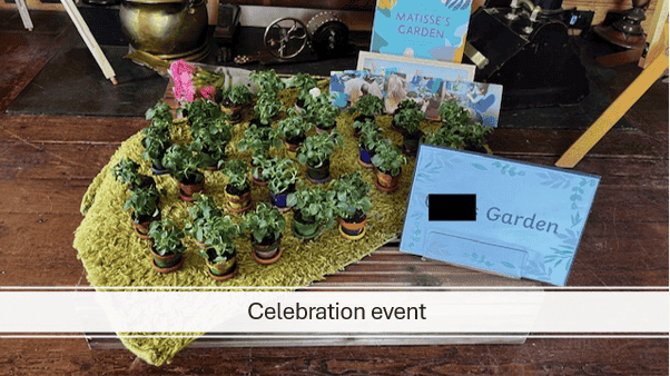 picture from the celebration event, shows the venue with various art supplies around